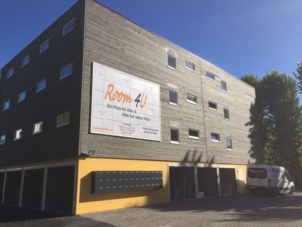 Room4U in Allschwil BL: Holzfassade aus Fichte l Krattiger Holzbau AG Amriswil