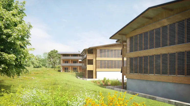 plus-energie-bau-alte-schmitte-güttingen-holzrahmenbau-krattiger-holzbau Visualisierung PlusEnergieBau Siedlung Alte Schmitte Güttingen mit Glas-Holz-Fassade